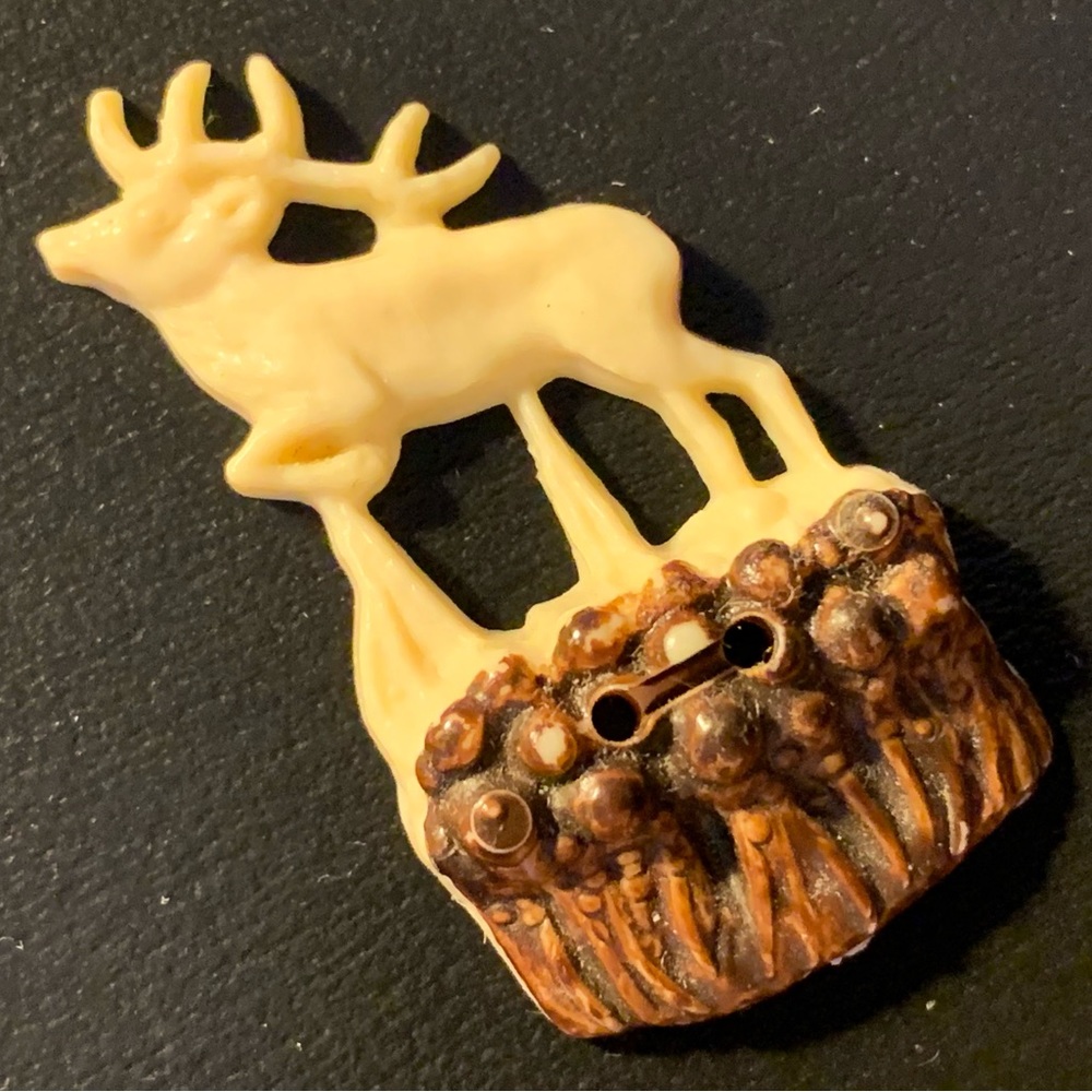 vintage deer with antlers stag plastic sewing button left facing cream brown